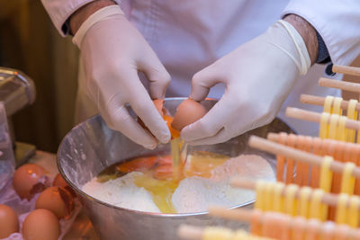 Close-up of hand holding ice cream