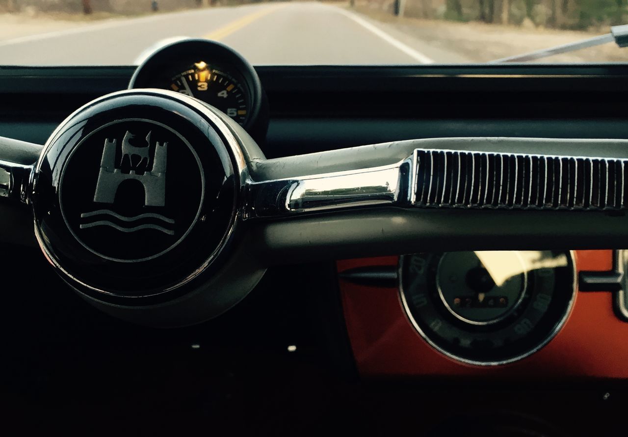 transportation, mode of transport, land vehicle, car, part of, close-up, vehicle part, travel, vintage car, headlight, cropped, vehicle interior, no people, reflection, side-view mirror, on the move, metal, stationary, day, old-fashioned