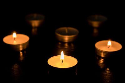 Close-up of lit tea light candle