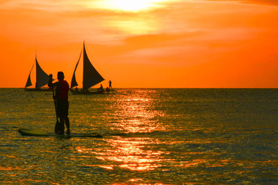 Scenic view of sea at sunset