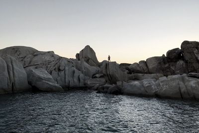 Scenic view of sea against clear sky during sunset