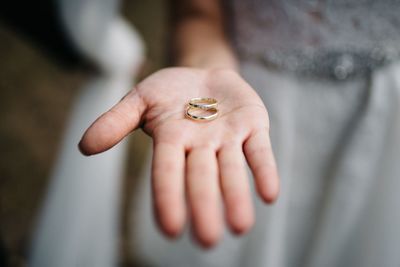 Close-up of couple holding hands