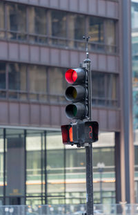 Illuminated stoplight in city