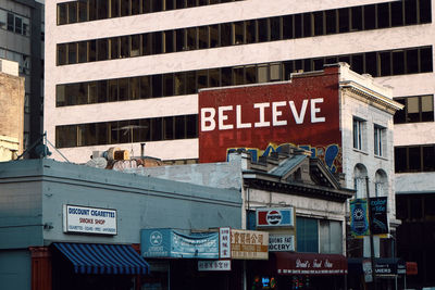 Information sign on building in city