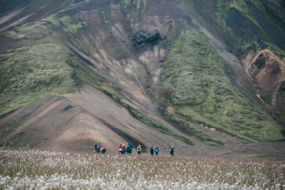 Group of people on mountain road