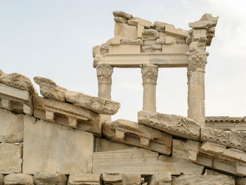 Low angle view of old ruins against sky