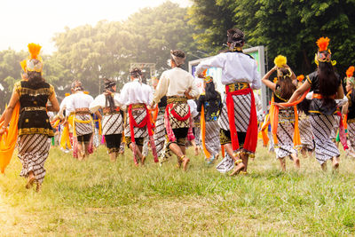 Colossal topeng dance performed by thousands of dancers in the wonosobo ,indonesia