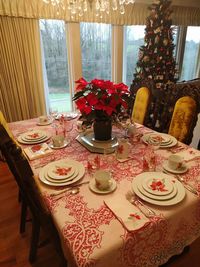 Flower vase on table at home