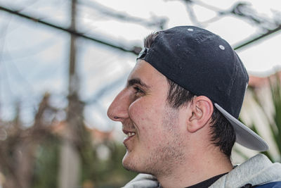 Portrait of young man looking away