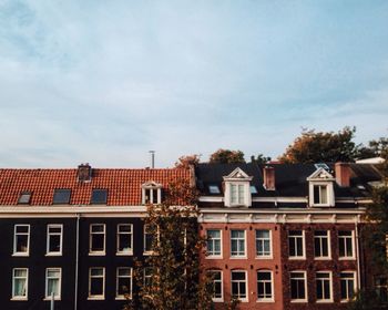 Low angle view of houses against sky