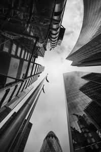 Low angle view of modern buildings against sky