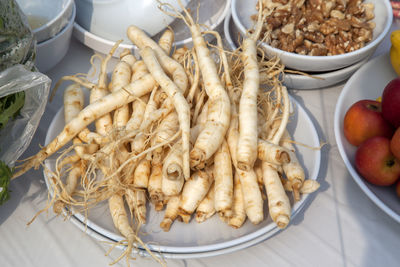 High angle view of ginseng on table