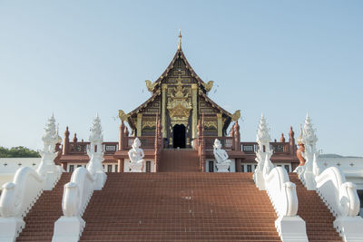 Exterior of temple against clear sky