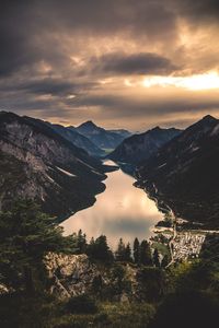 Scenic view of mountains against sky during sunset