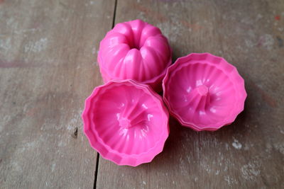 High angle view of pink flowers on table