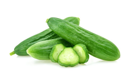 Close-up of green pepper against white background