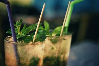 Close-up of mojitos served on table
