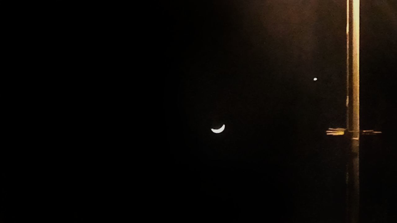 night, moon, dark, nature, no people, astronomy, crescent, beauty in nature, illuminated, indoors, sky, close-up, space, moon surface, half moon, solar eclipse