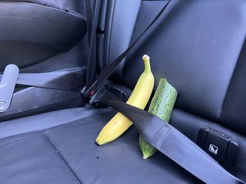 The banana and cucumber understand the importance of safe driving.  always wear a seat belt