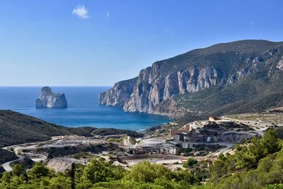 Scenic view of sea against blue sky