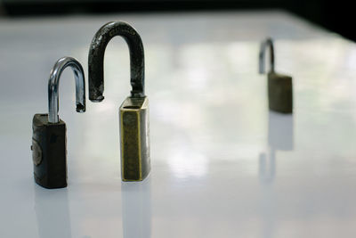 Close-up of locks on table