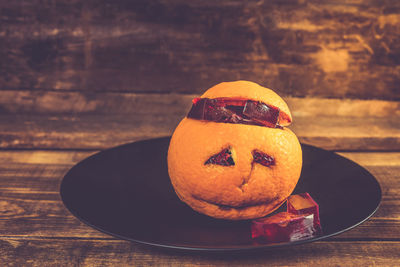 Close-up of pumpkin in plate on table