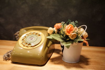 Close-up of flower vase on table