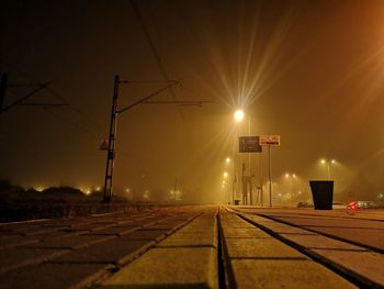 View of railroad tracks at night