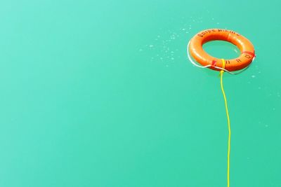 Safety ring floating in swimming pool