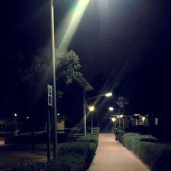 Illuminated street lights at night