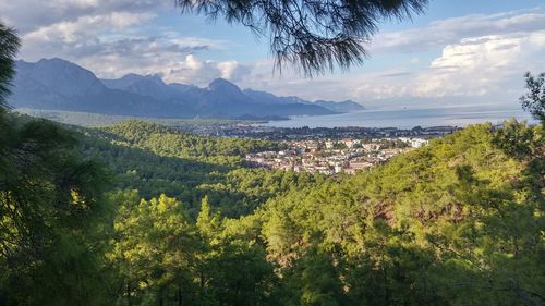 Scenic view of mountains against cloudy sky