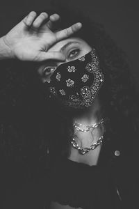 Close-up of woman with hand