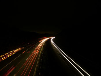 Light trails on road at night