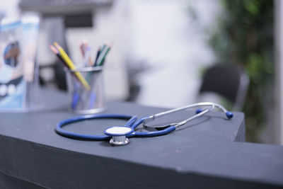 Close-up of stethoscope on table