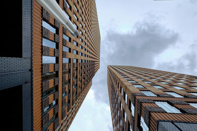 Low angle view of modern building against sky