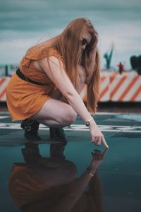 Young woman in swimming pool