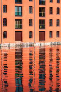 Abstract water reflections at an apartment building