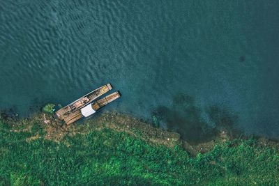 High angle view of ship on sea shore