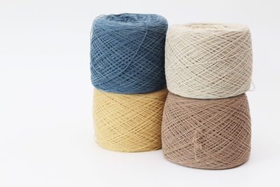 Close-up of multi colored pencils over white background