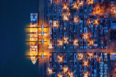 Reflection of illuminated lights on water at night