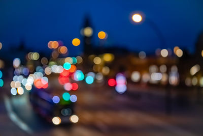 Defocused image of illuminated lights at night