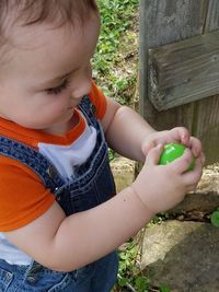 High angle view of baby girl playing