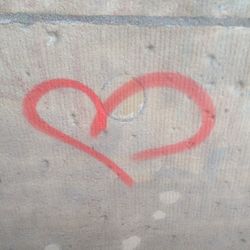 Close-up of heart shape on wall