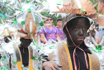 Close-up of girl standing in costume during carnival
