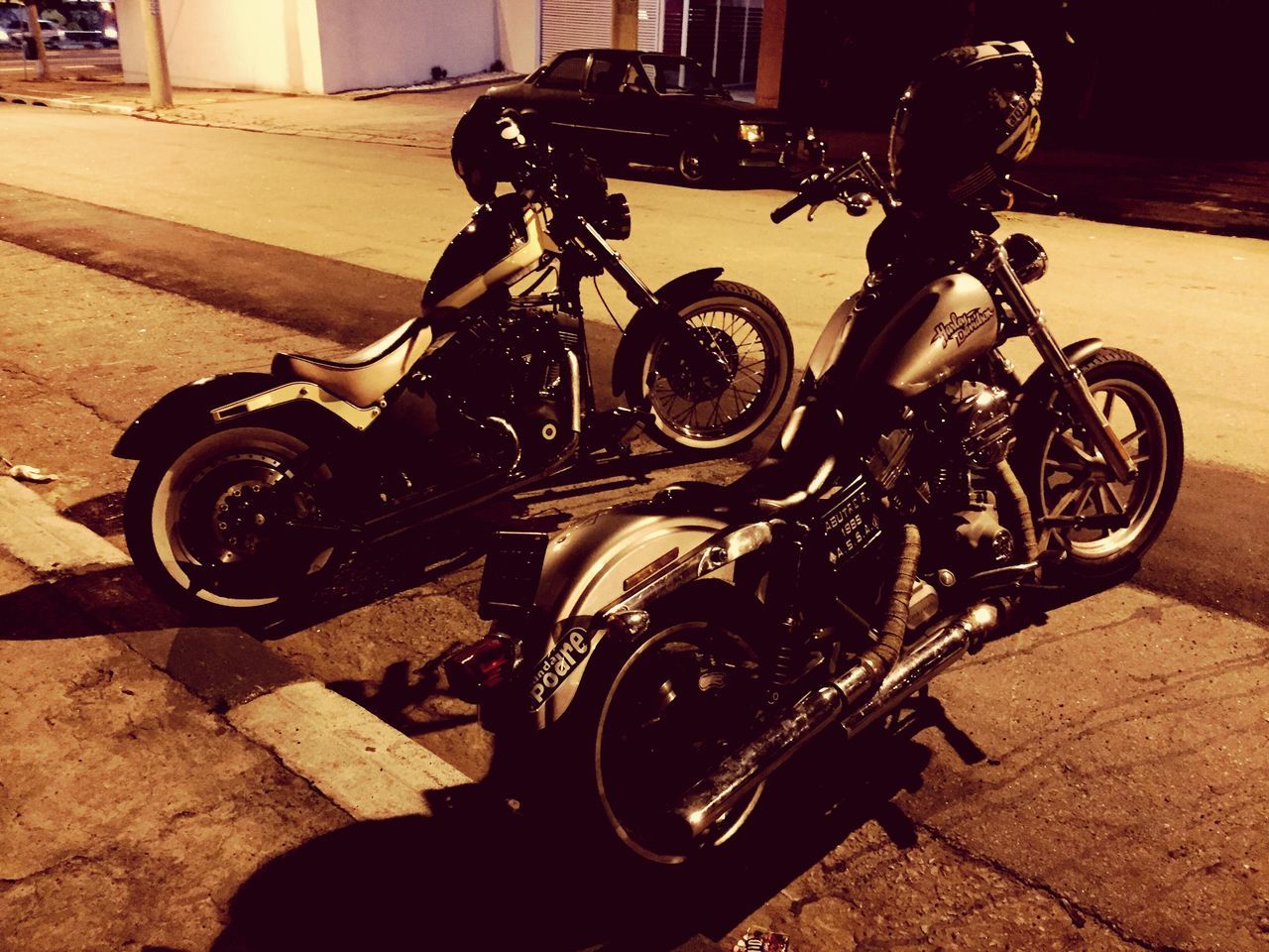 BICYCLES PARKED BY ROADSIDE