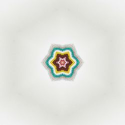 High angle view of multi colored candies against white background