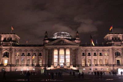 Low angle view of historical building against cloudy sky