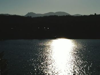 Scenic view of silhouette mountains against sky