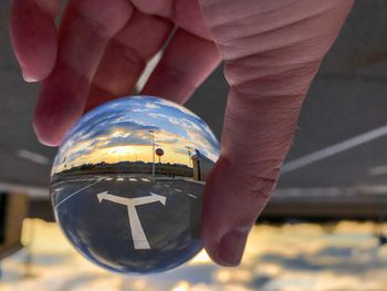 Close-up of person holding ball