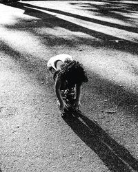 Shadow of people on road